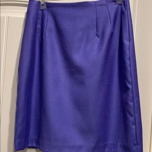 Such a pretty color…Above knee, periwinkle blue 100%wool.